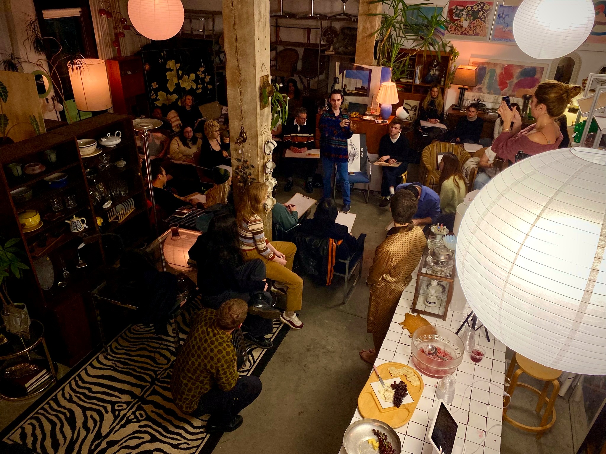 Artists gathered in an intimate Brantwood Atelier drawing salon.