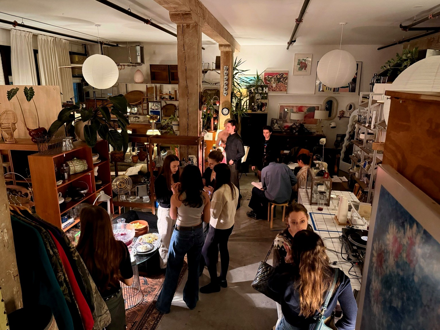 Participants reviewing drawings together after a Brantwood Atelier session.