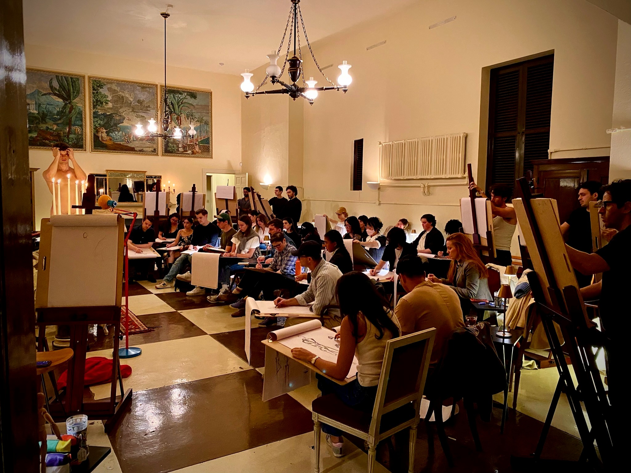 Artists working at easels during a Brantwood Atelier class.